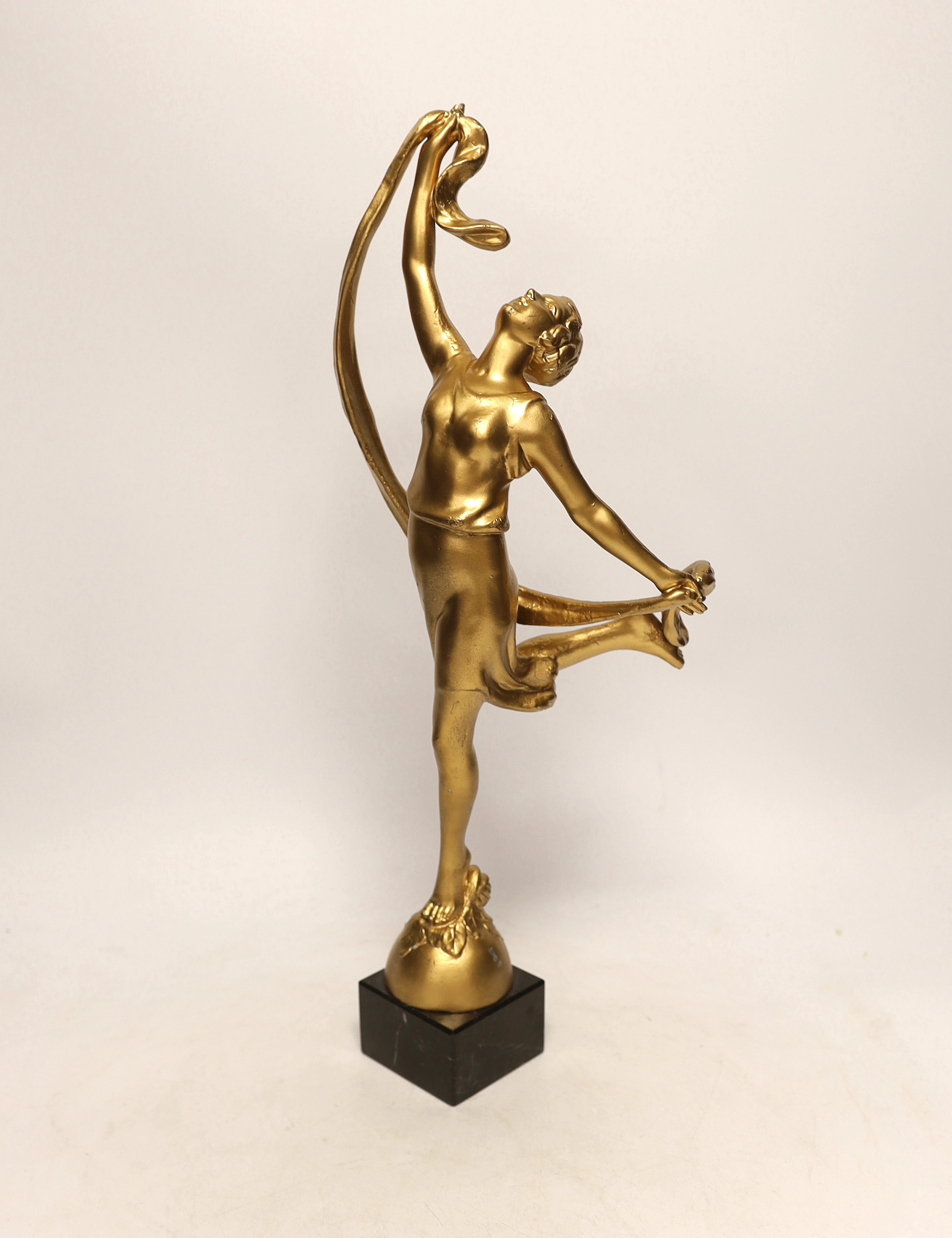 P. Sega, a gold painted figure of a lady on a marble base, 44cm